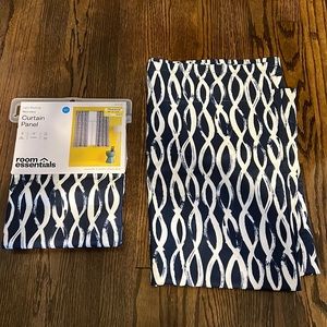 Navy blue and white, pattern curtains. 2 panels total. 42” wide. 63” long.